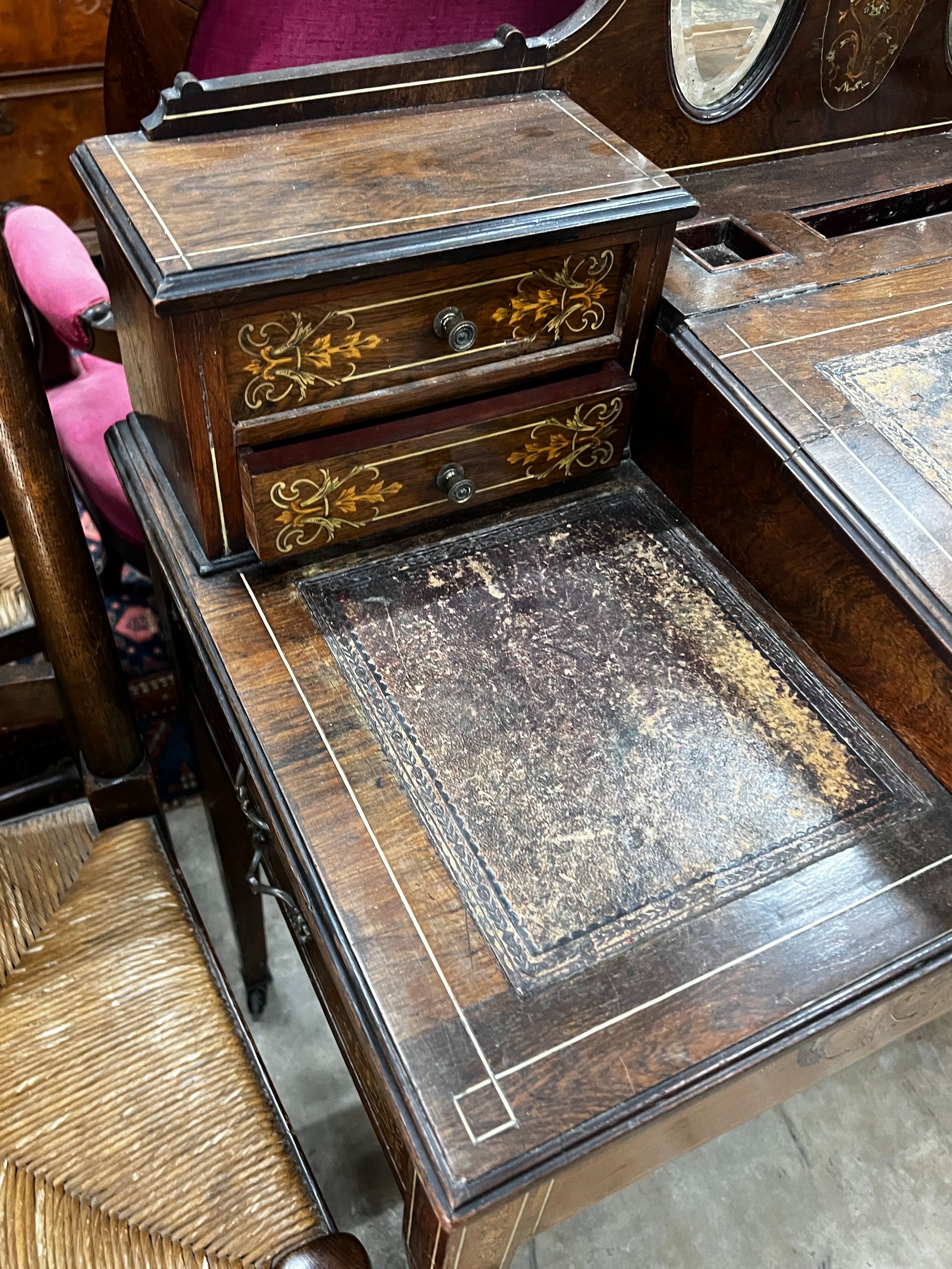 An Edwardian marquetry inlaid rosewood writing desk, width 98cm, depth 46cm, height 113cm